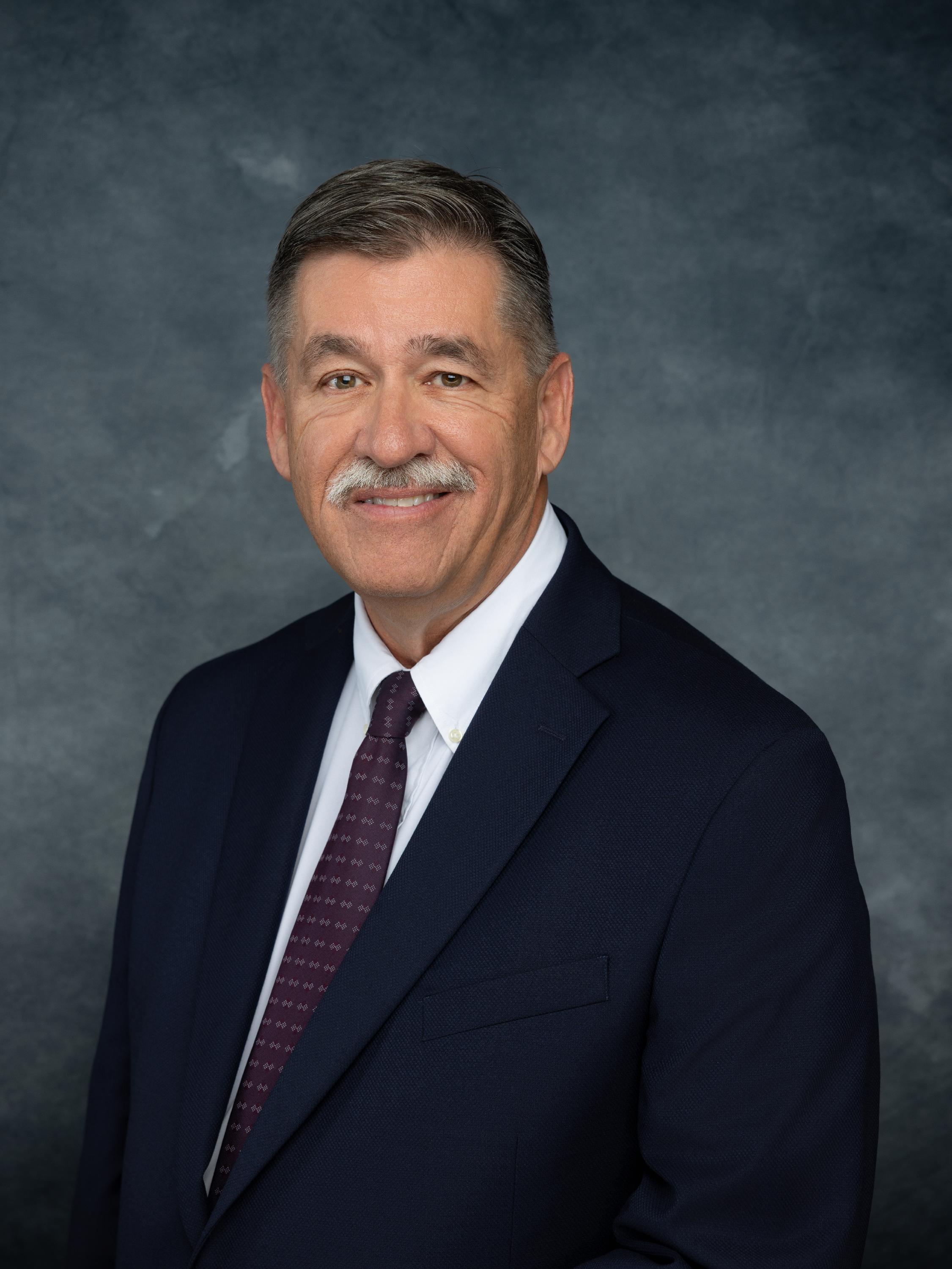 Headshot of Commissioner Mark McAlees